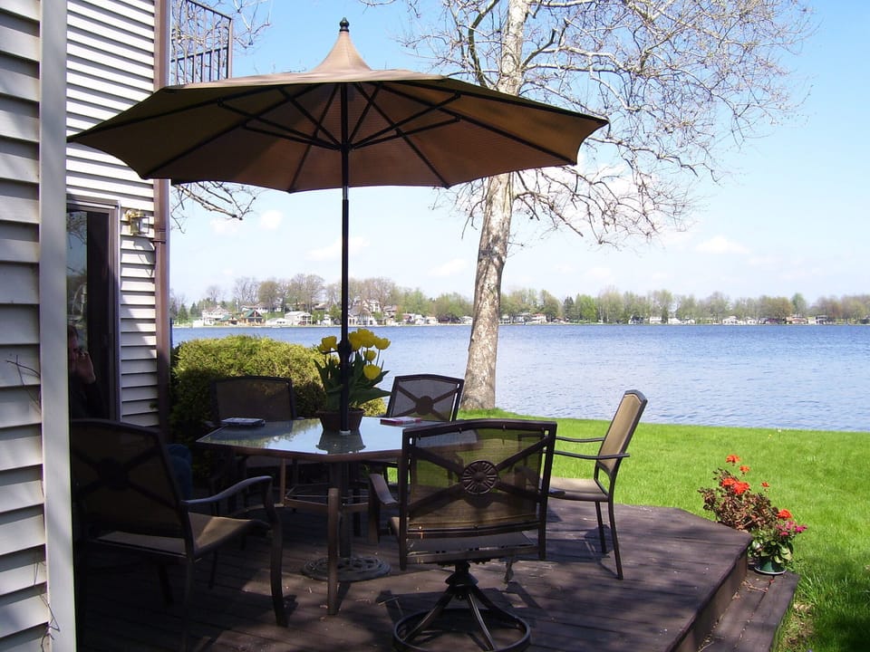 A yard for play while great swimming, fishing and boating are just steps away!