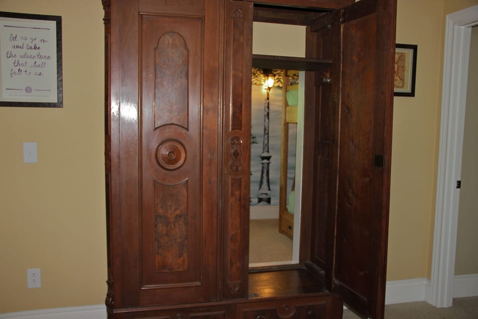 Climb through the wardrobe to Narnia - the kids bunk room