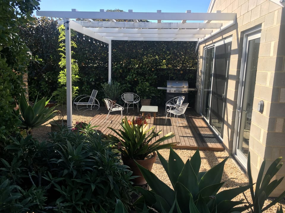 Rear Courtyard/Pergola & BBQ Area