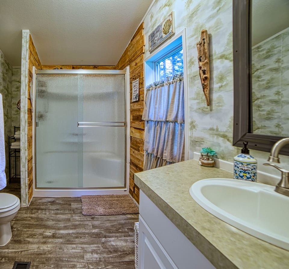 On suite "King Bathroom" full bathroom - Walk-in shower.