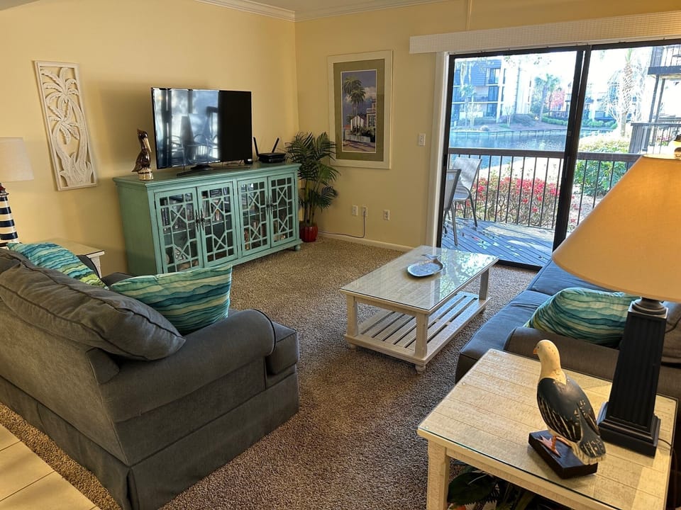 Living room with Smart HDTV, supports Netflix, YouTube and Prime video