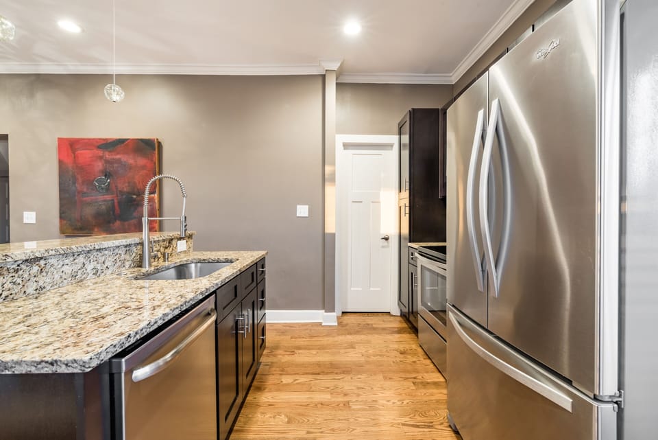 Kitchen with Half bathroom on main level just off kitchen.
