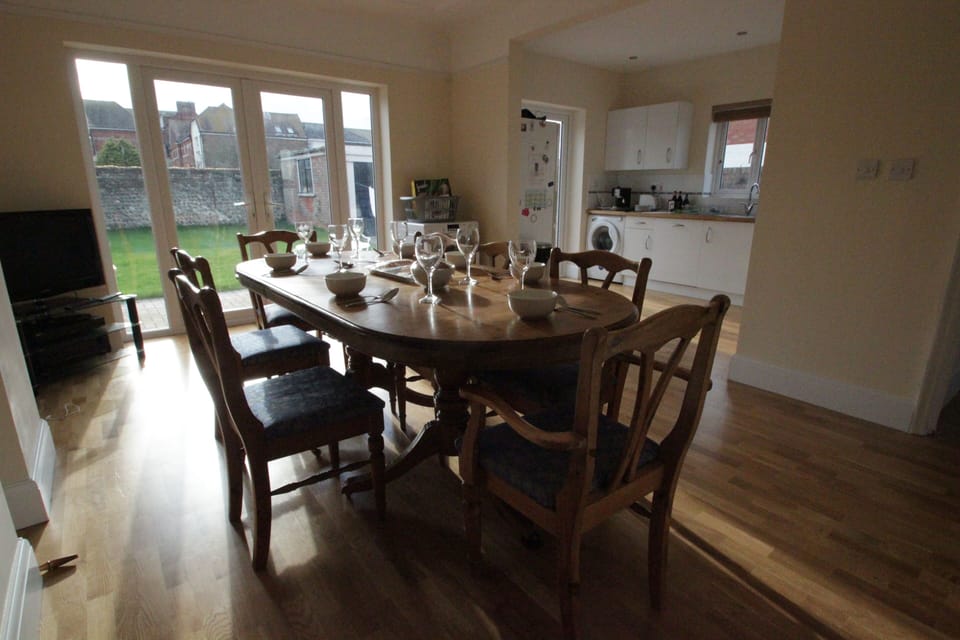 open plan kitchen dining area with a view of the garden