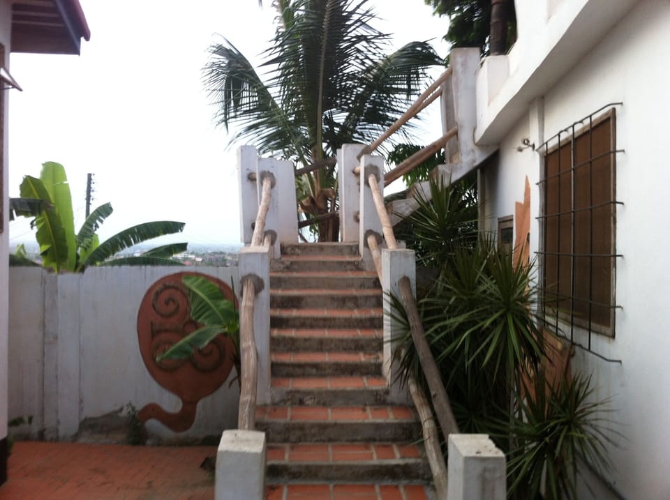 stairs above kitchen to roof top space