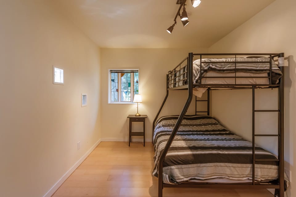 Second bedroom has a double and twin bed.