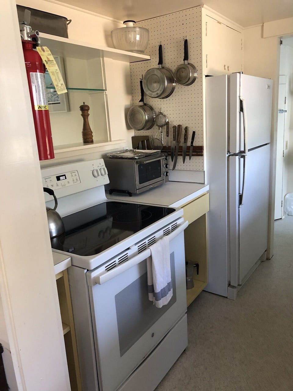 Kitchen with full sized fridge