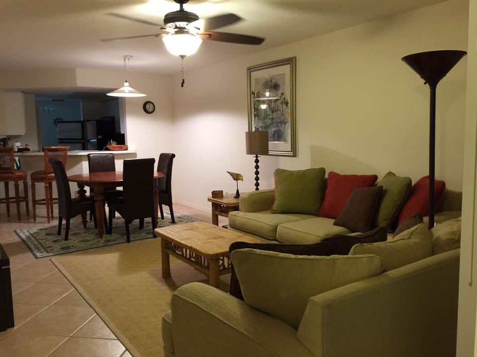 long view looking from lanai to living room, dining room, kitchen 