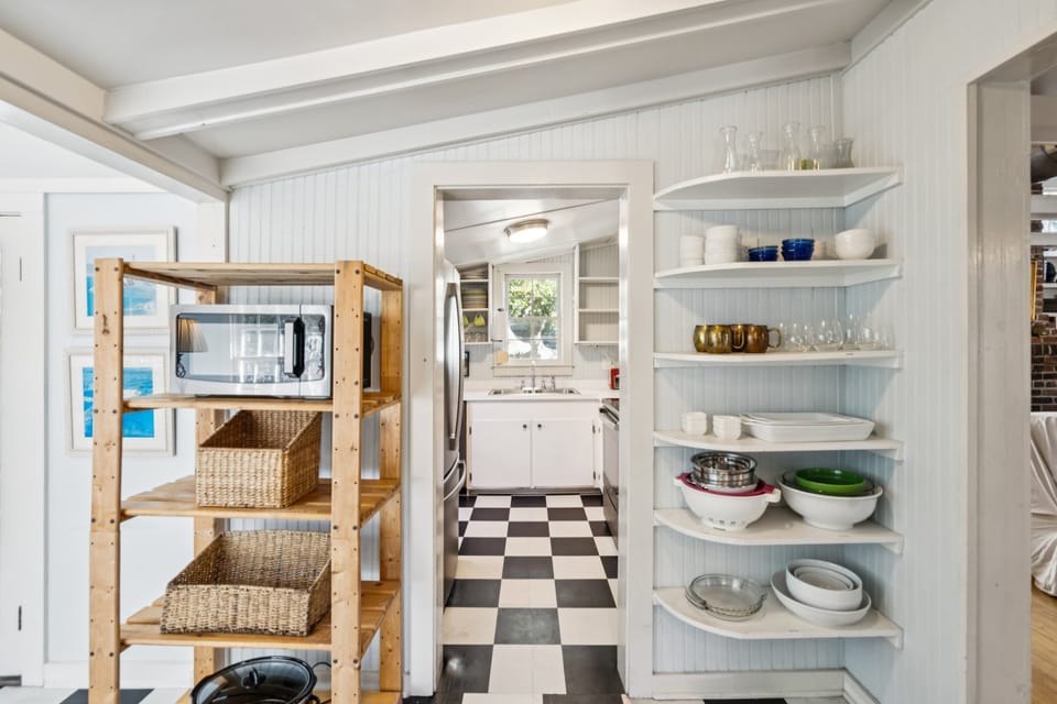 Everything you need, nothing you don't! Our charming, efficient kitchen is perfectly set up for quick beach lunches and sunset dinners.