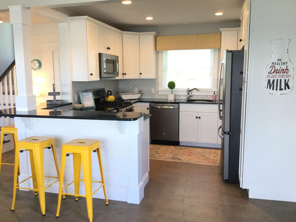Fully stocked kitchen including a lobster pot, tea kettle, French press and more