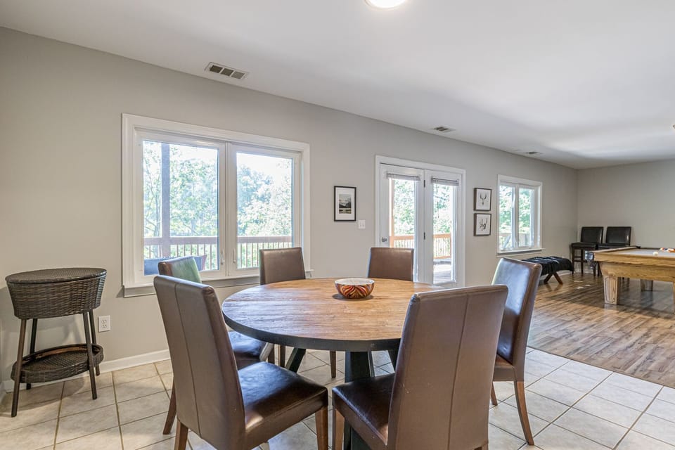 Terrace level dining/gaming table with seating for 6