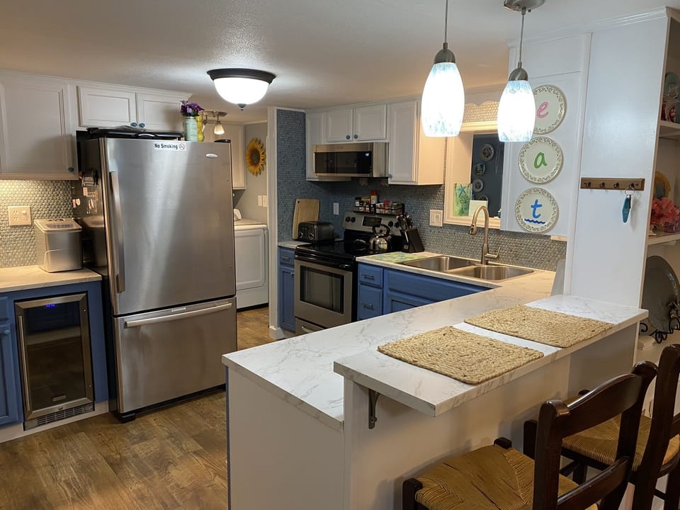 Kitchen with bar seating.