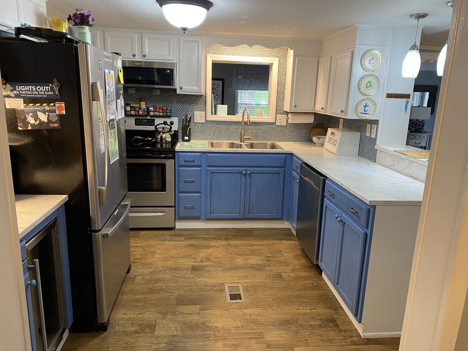 Modern kitchen w/wine cooler & coffee bar. Fully loaded for cooking and baking.