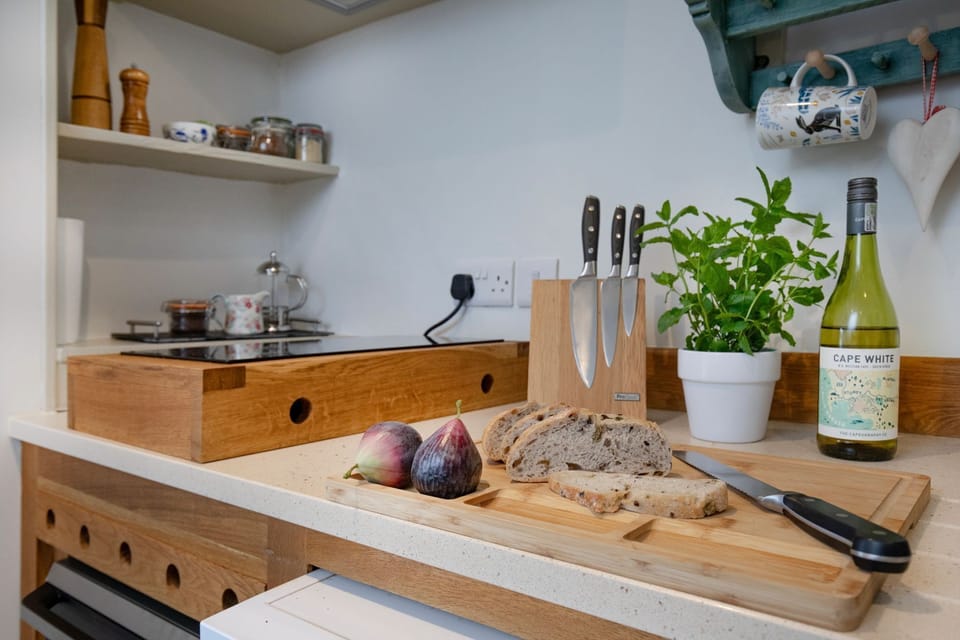 Prepare a meal for two in the well-equipped kitchen