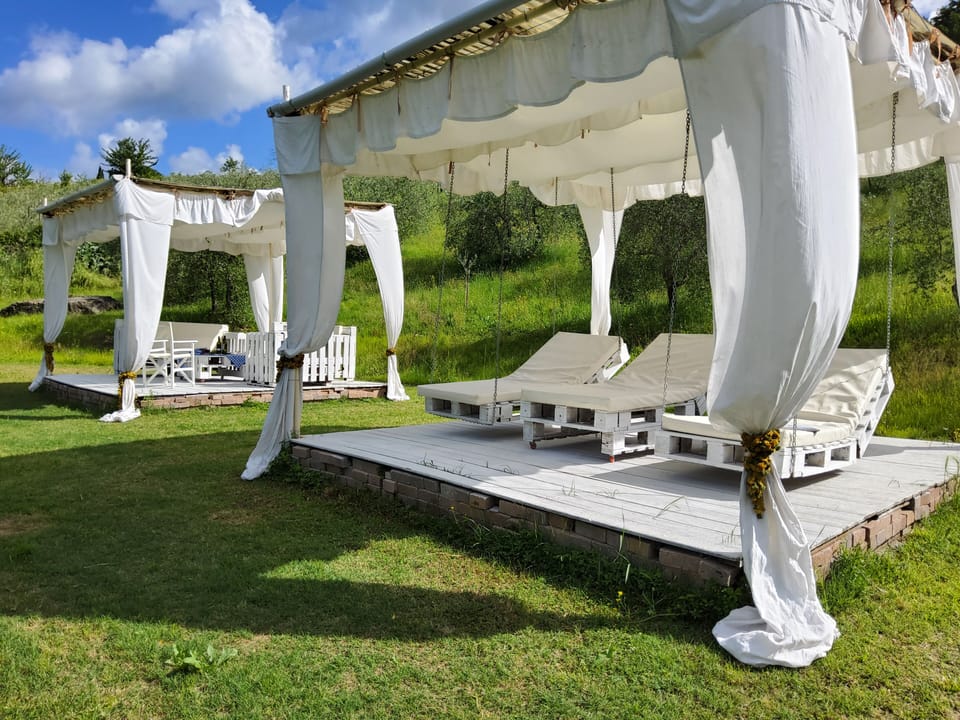 2 Elegant Gazebos located in the middle of a huge lawn