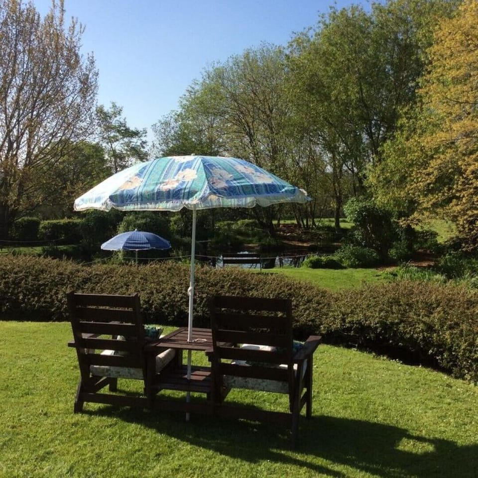 Top lawn area looking down to the pond.