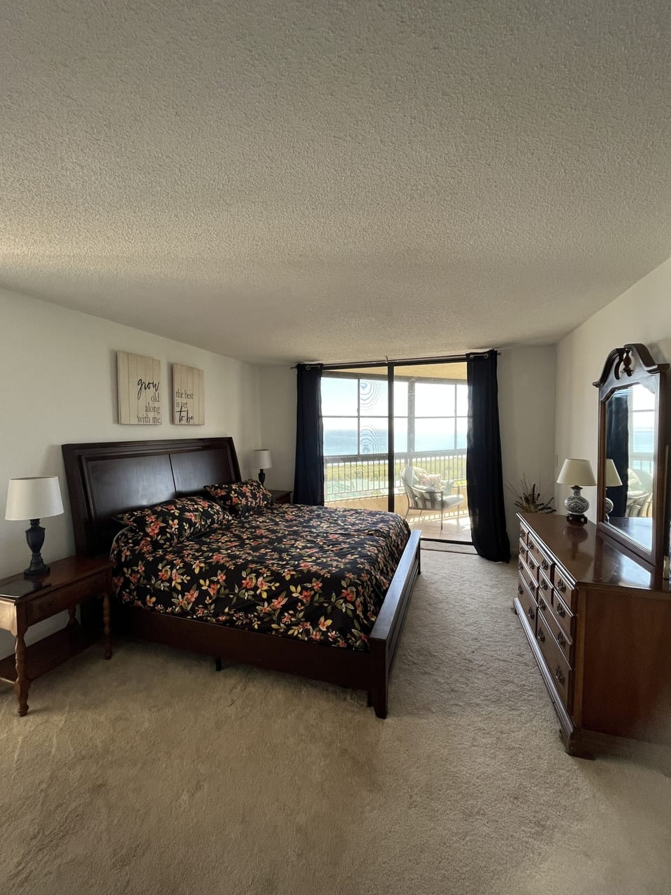 Second bedroom with king bed and flat screen tv. 