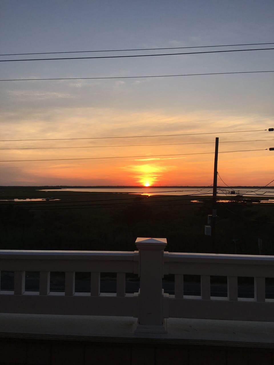 Bay Sunset from Dining Room Deck and Bay Bedroom