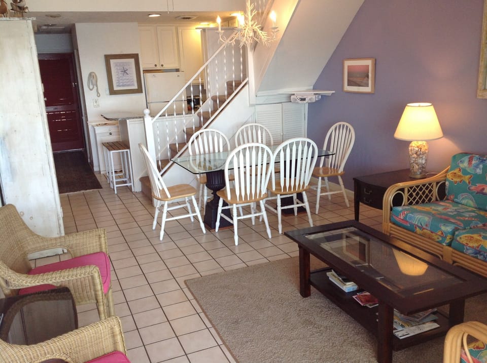 Kitchen, Dining and living room area. All face deck and beach.