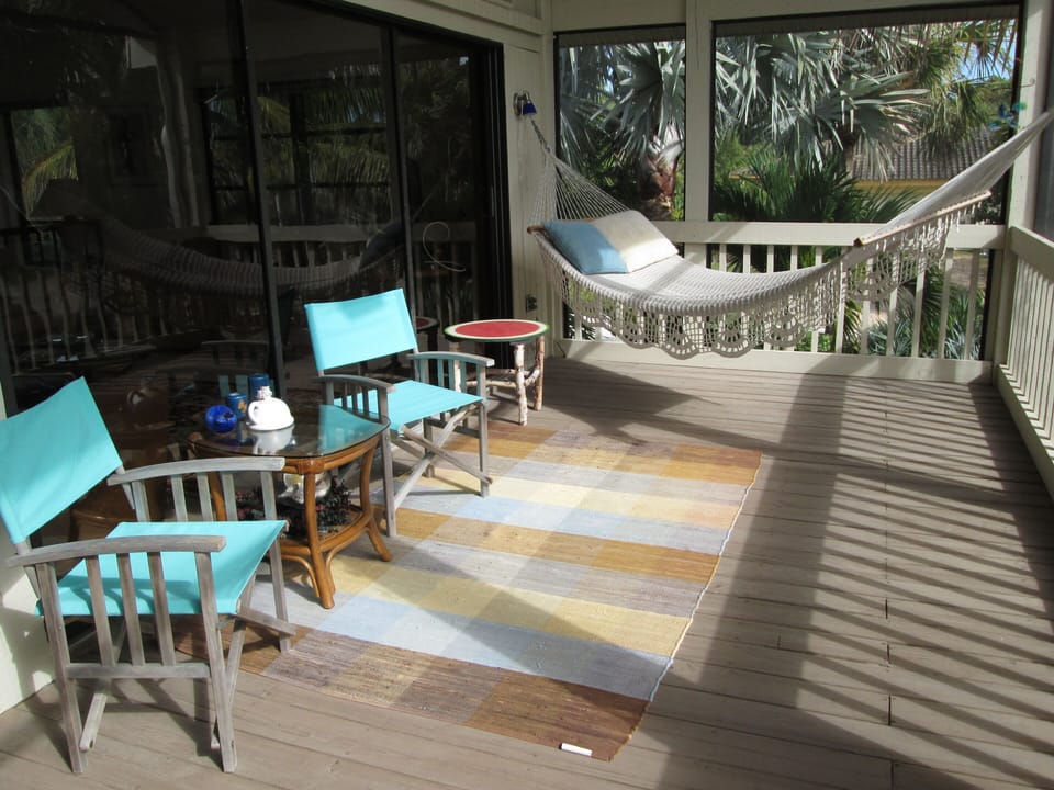 Afternoon nap on the hammock on the screened porch.