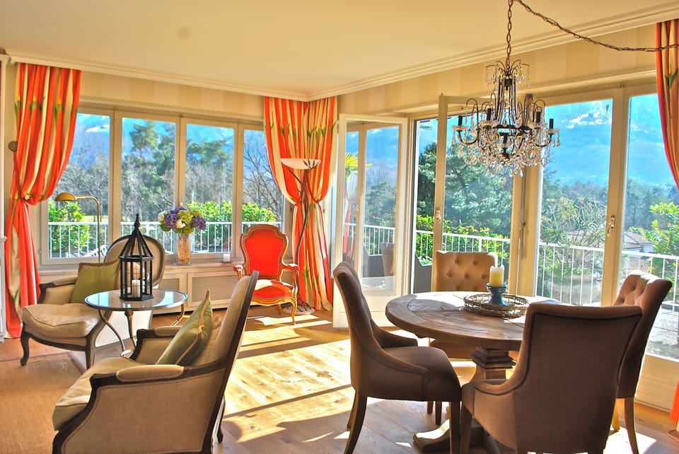 Spacious & Bright: Dining area with french doors opening onto terrace 