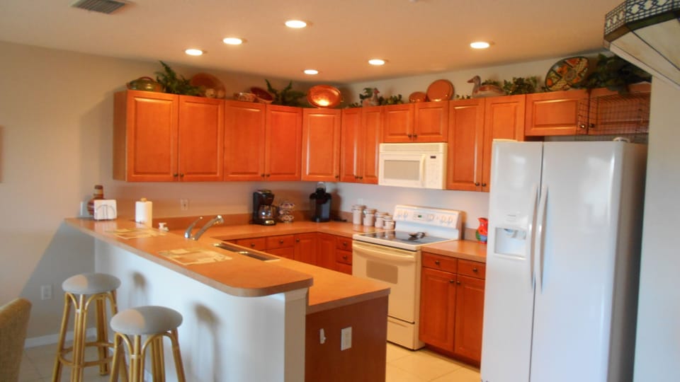 Plenty of counter space, storage and refrigerator with ice and water in the door