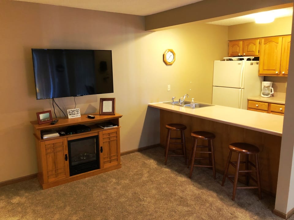 Updated appliances, new carpeting throughout