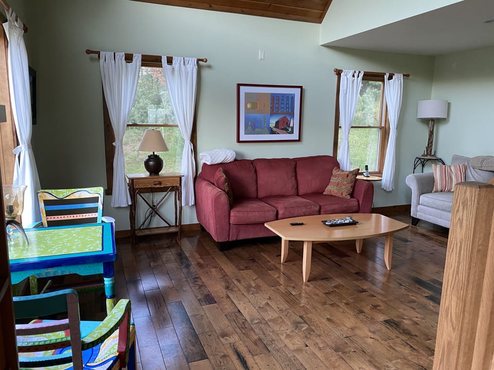 Open floor plan connects kitchen, dining room, and living room