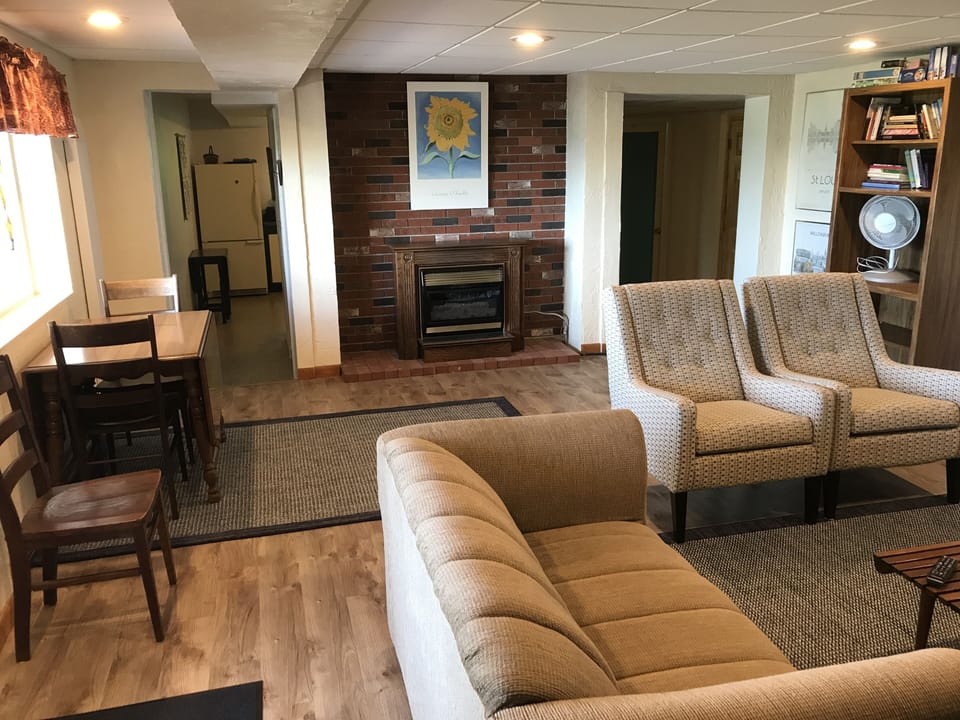 Dining area includes gas fireplace for heat when needed.