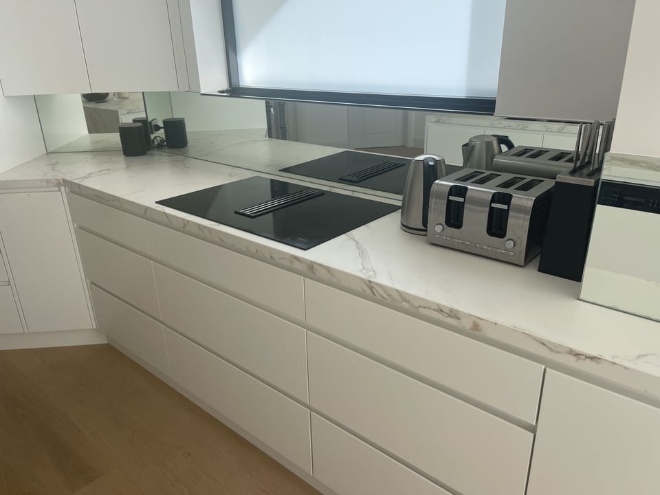 4 burner induction Miele cooktop with exhaust