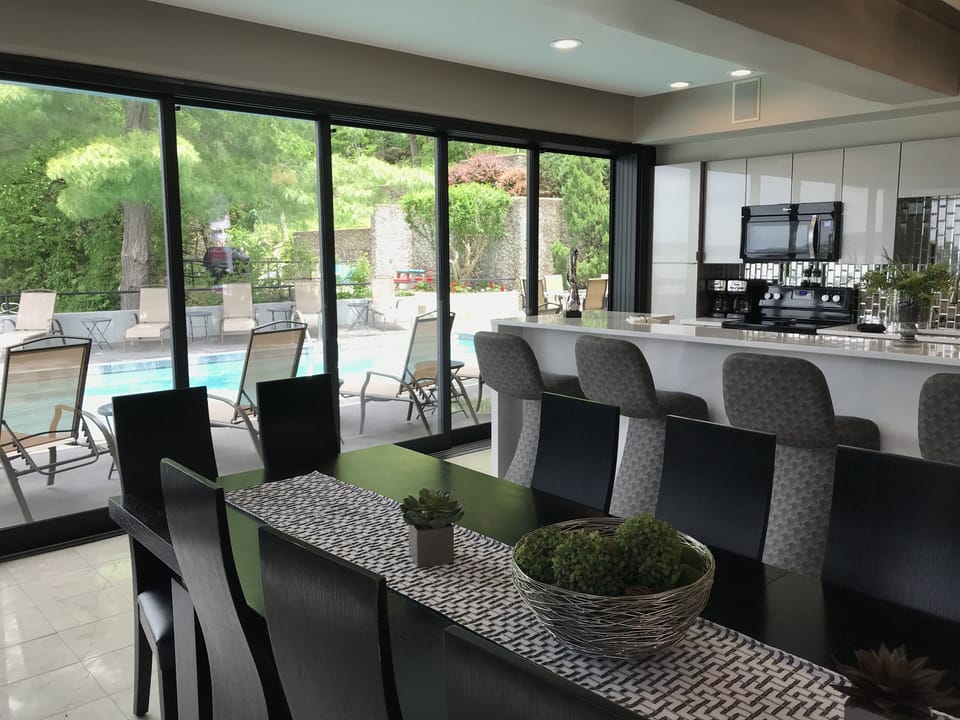 Dining and kitchen are so close to the pool area.