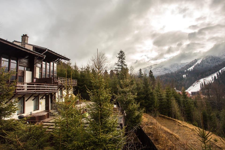 Side view of the villa and ski slopes Sorica and Cazacu
