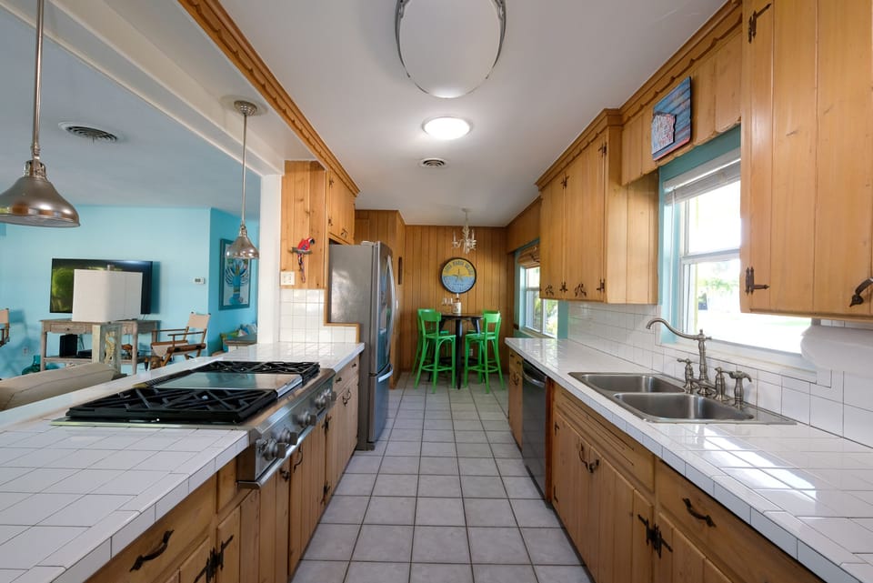 Well stocked kitchen for cooking and entertaining. 