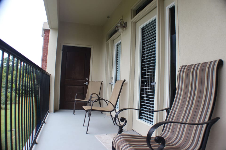 Peaceful balcony. Enjoy the view of the Little Pigeon River and mountains.