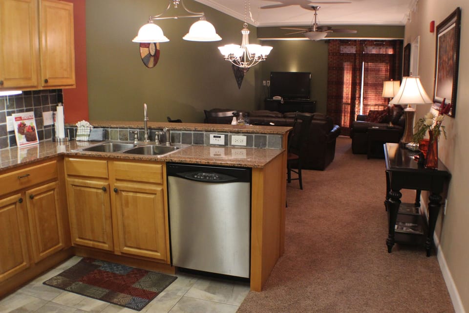 A dishwasher is always a plus. The bar seats three.