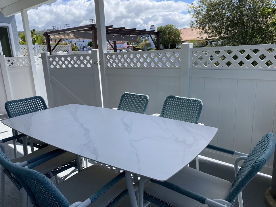 Outside dining for six in covered patio