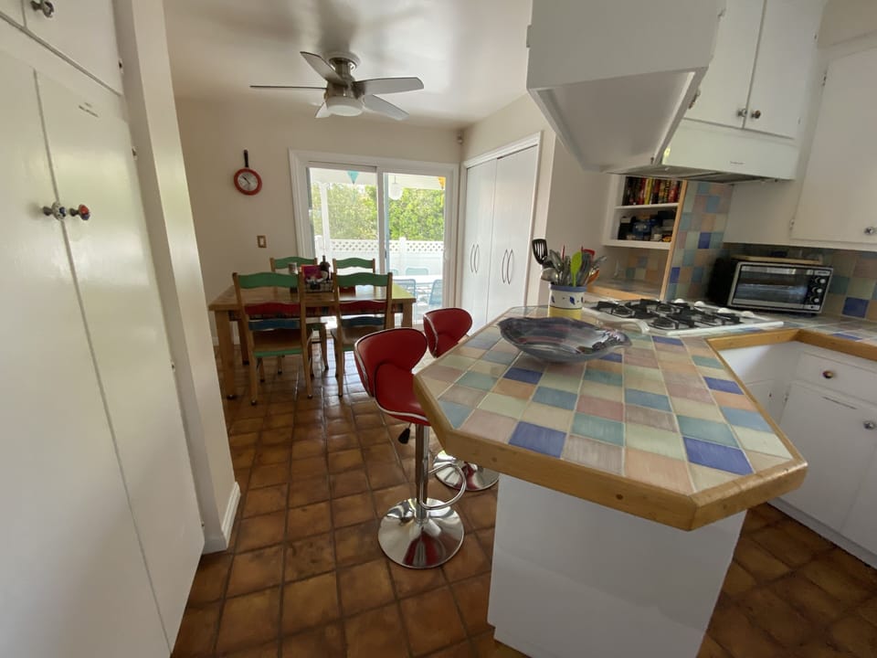 Pantry filled with spices and small appliances