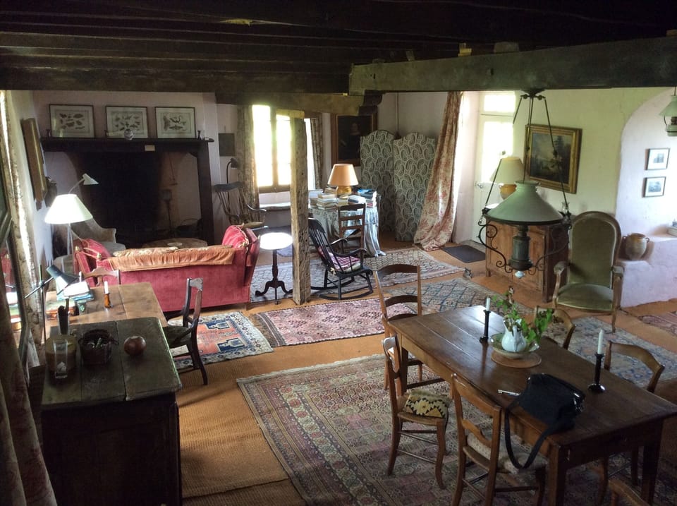View of Main room from stairs leading to upper floor