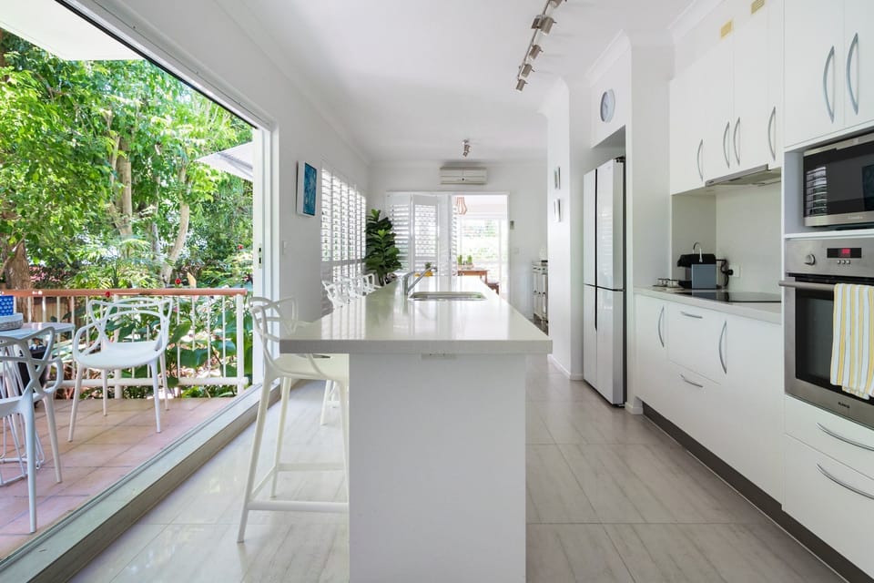 Kitchen with Nespresso coffee maker and modern appliances
