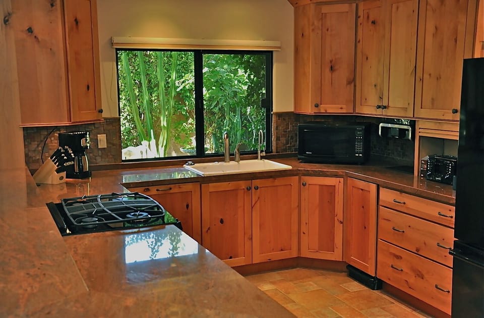 The range and oven are full sized.