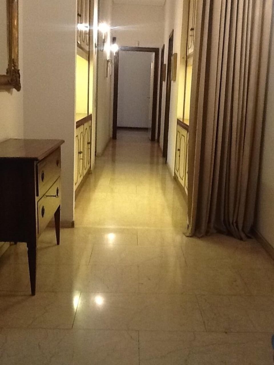 My spacious apartment develips along a long hallway that connects all rooms.