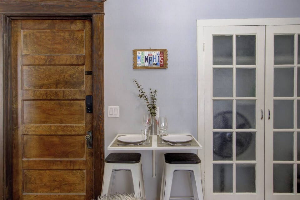 Cozy dining area with a 2-seat table.