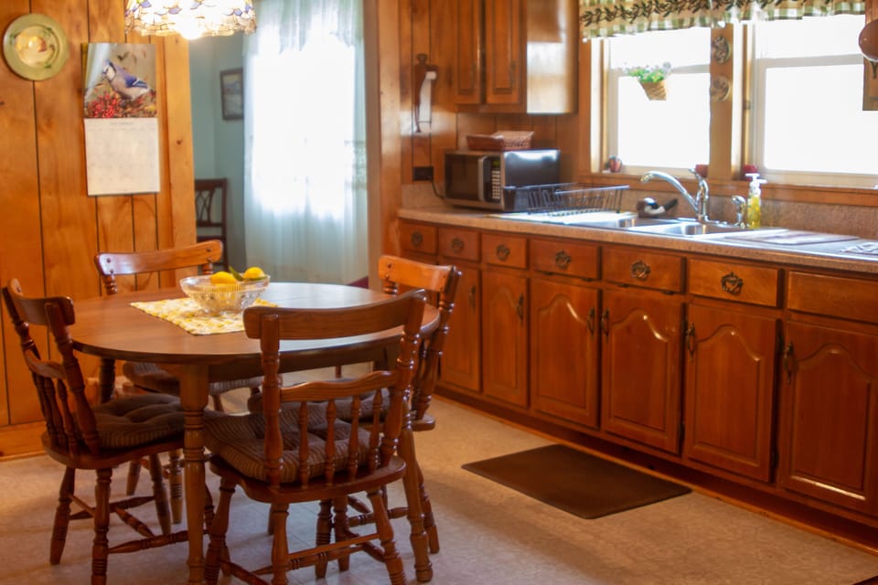 Kitchen view- stove and fridge located toward left of this frame 