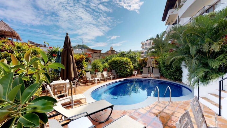 Pool and lush tropical gardens
