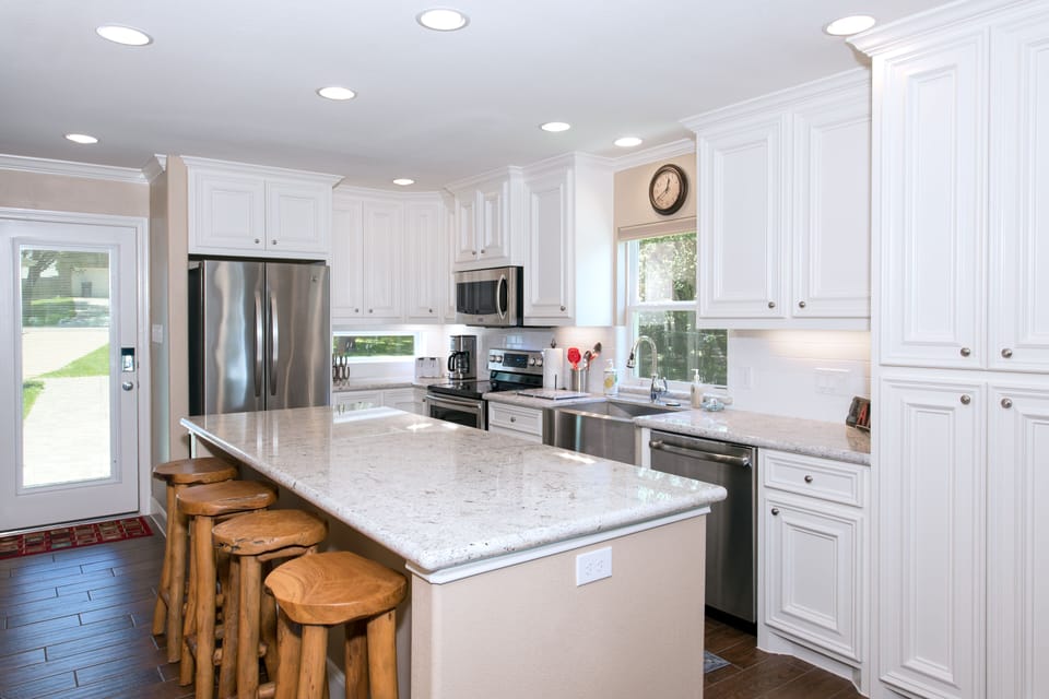 Island kitchen with stainless steel appliances