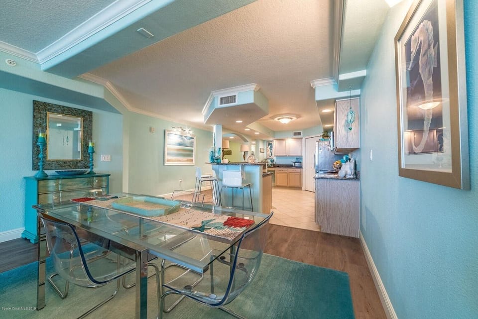 Breakfast Room with Kitchen in the backgound. Table seats 6.