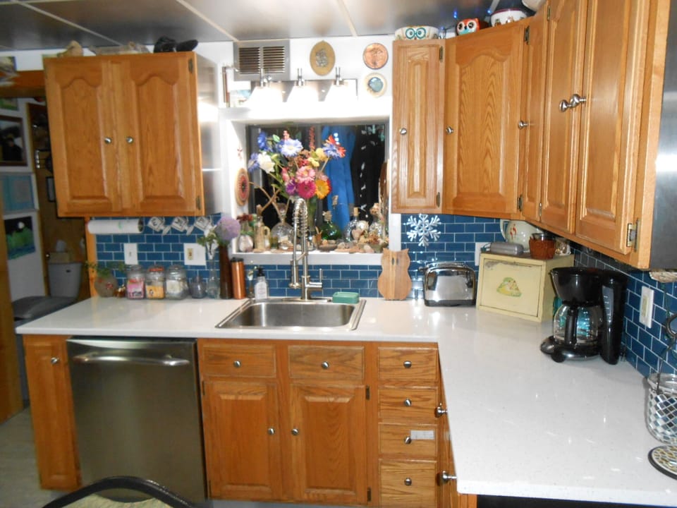 Coffee maker, toaster, dishwasher, dishes and utensils for everything