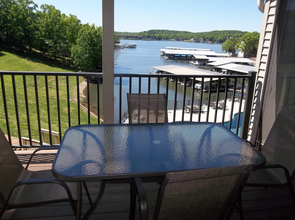 Wonderful view of the lake, pool and hot tub from your balcony!