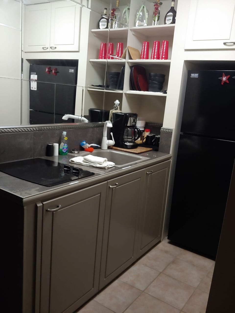 Wet Bar/ Kitchenette 
Fridge/ Freezer, 2 burner stove top, coffee pot, microwave