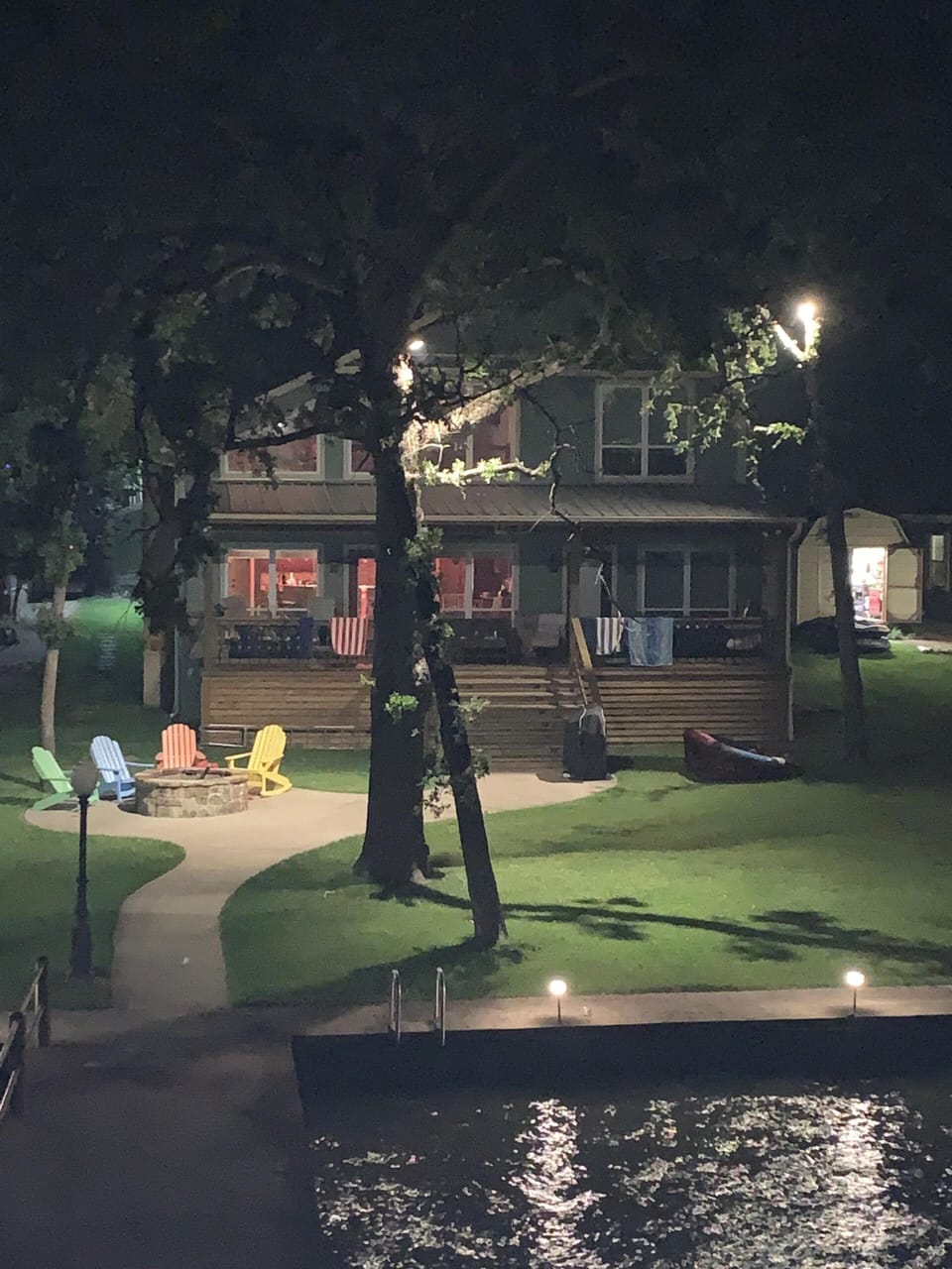 Backyard at night with tree lights on