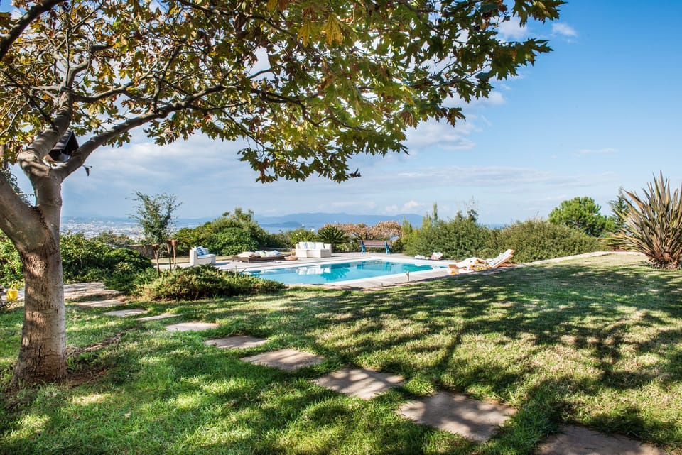 Villa Mariposa - Private spacious pool area with panoramic sea and city view.